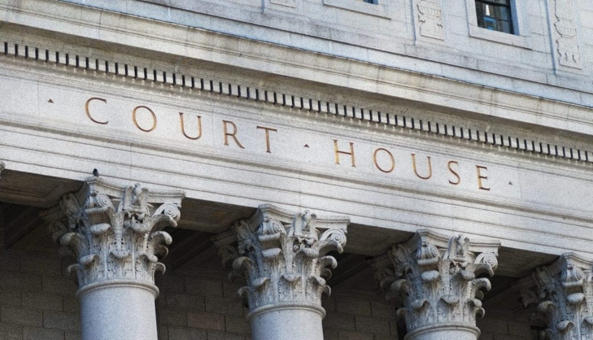 The words Court House outside the Supreme Court