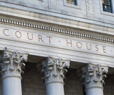 The words Court House outside the Supreme Court